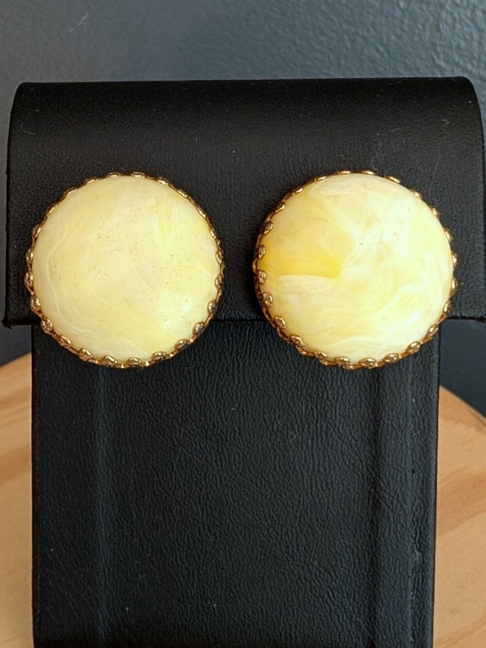 Pale lemon yellow and white swirl design vintage clip on earrings